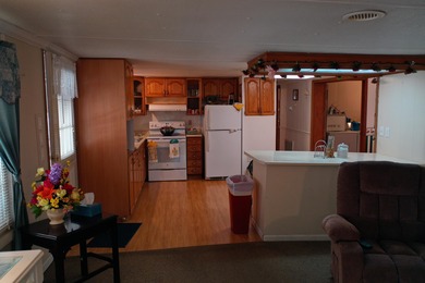 75 acres with a well maintained 3 Bedroom 2 Bath manufactured