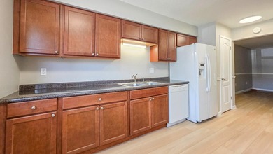 Freshly updated townhome, WITH A BRAND NEW ROOF in 2026. This - photo 1
