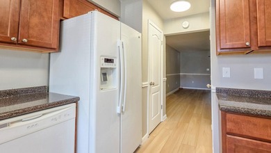 Freshly updated townhome, WITH A BRAND NEW ROOF in 2026. This - photo 3