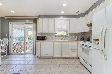 Welcome to this wonderful, single family home in the highly - photo 9