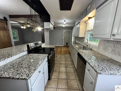 4-bed, 2-bath home in Warsaw featuring an open floor plan - photo 6