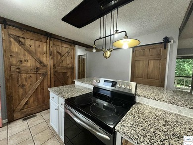 4-bed, 2-bath home in Warsaw featuring an open floor plan - photo 8