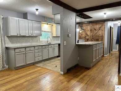4-bed, 2-bath home in Warsaw featuring an open floor plan - photo 10