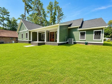 Luxury meets lakeside living in this fully custom new - photo 2