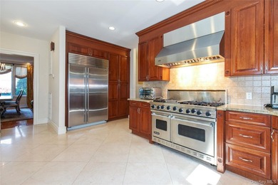 LAKE SUCCESS - A Stately Brick Colonial Set On Beautifully - photo 11