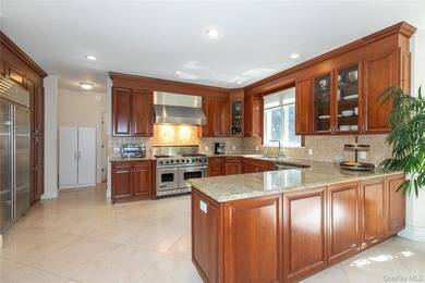 LAKE SUCCESS - A Stately Brick Colonial Set On Beautifully - photo 12