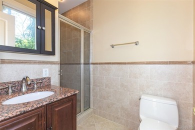 LAKE SUCCESS - A Stately Brick Colonial Set On Beautifully - photo 22