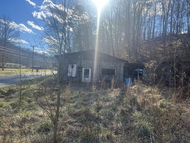 Nestled along the side of the road, this charming home awaits - photo 3