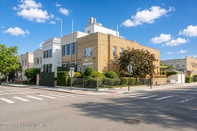 Welcome to this solid brick 5/5 two-family semi-attached home - photo 3