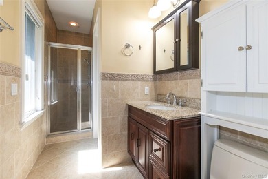 LAKE SUCCESS - A Stately Brick Colonial Set On Beautifully - photo 25