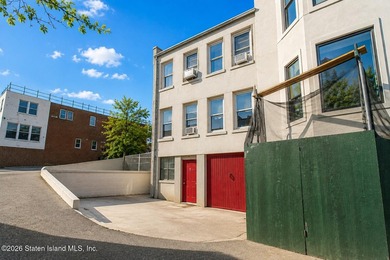 Welcome to this solid brick 5/5 two-family semi-attached home - photo 5