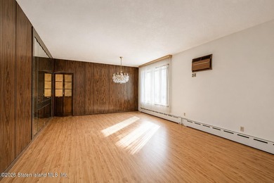 Welcome to this solid brick 5/5 two-family semi-attached home - photo 7