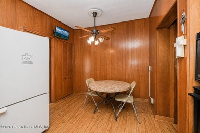 Welcome to this solid brick 5/5 two-family semi-attached home - photo 9