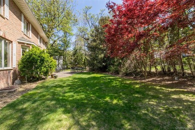 LAKE SUCCESS - A Stately Brick Colonial Set On Beautifully - photo 30