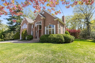 LAKE SUCCESS - A Stately Brick Colonial Set On Beautifully - photo 32