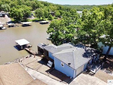 Located on a quiet cove on the Lake of the Ozarks in a very - photo 1