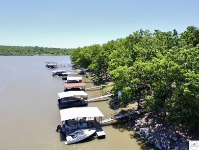 Located on a quiet cove on the Lake of the Ozarks in a very - photo 7
