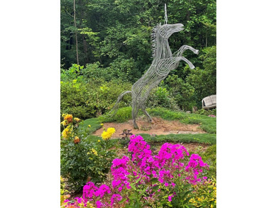 Behind the iconic hand-crafted periwinkle gates of Bluescape - photo 3
