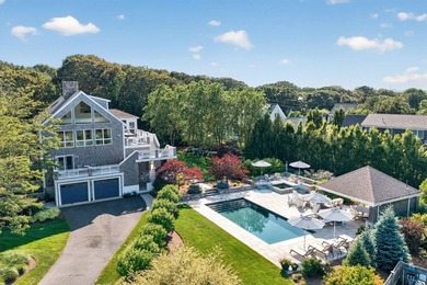 Experience luxury coastal living in this stunning 4-bedroom/ - photo 1