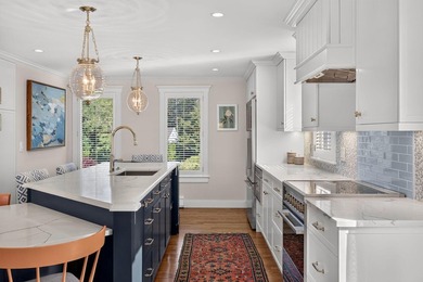 Experience luxury coastal living in this stunning 4-bedroom/ - photo 9