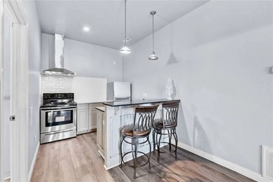 Discover the perfect blend of lakefront living and rental income - photo 40