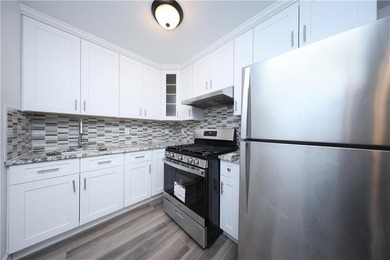 Welcome to this luxury elevated condo located in the heart of - photo 3