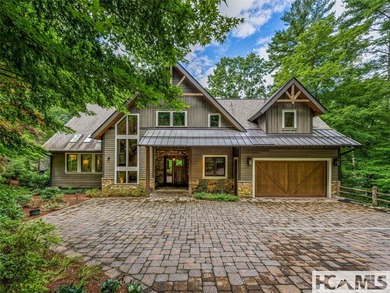 Experience lakeside luxury in this magnificently updated - photo 1