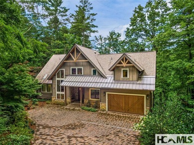 Experience lakeside luxury in this magnificently updated - photo 2