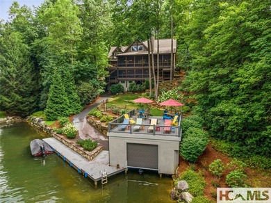 Experience lakeside luxury in this magnificently updated - photo 3