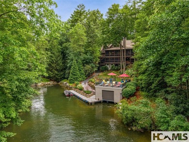 Experience lakeside luxury in this magnificently updated - photo 4