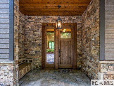 Experience lakeside luxury in this magnificently updated - photo 7
