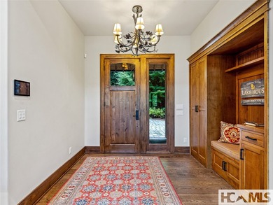 Experience lakeside luxury in this magnificently updated - photo 8