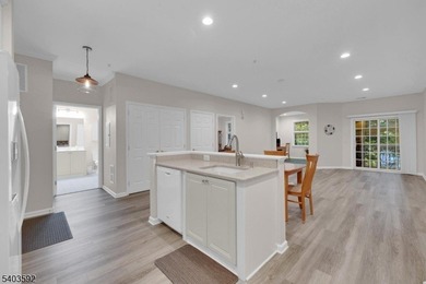 Enjoy effortless living in this desirable active adult community