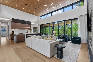Welcome to an extraordinary lakefront retreat in the prestigious - photo 4