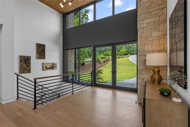 Welcome to an extraordinary lakefront retreat in the prestigious - photo 5