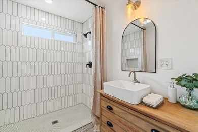 Coastal charm meets modern comfort in this beautifully renovated - photo 11