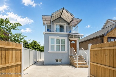 Welcome to this fully detached home in Midland Beach. The first - photo 1
