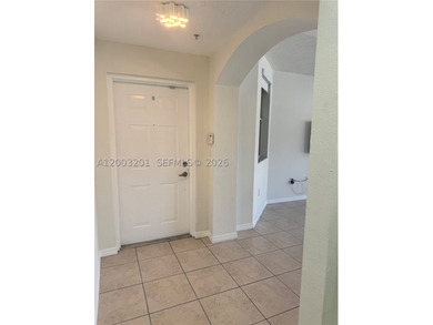 Step into this spacious 3-bedroom , 2 bath first-floor condo - photo 2