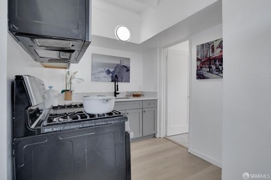This well-maintained triplex presents a rare opportunity to own - photo 3