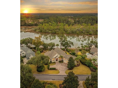 Tranquil waterfront views set the tone for this custom H2-built - photo 2