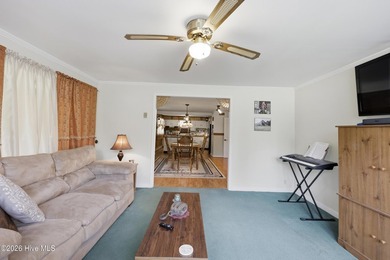 Corner-lot living with space and flexibility! This 3-bedroom - photo 12