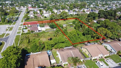 This prime 1.41-acre property in central Lake Worth offers two - photo 12