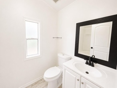 This is a charming, move-in-ready mobile home located in a - photo 13