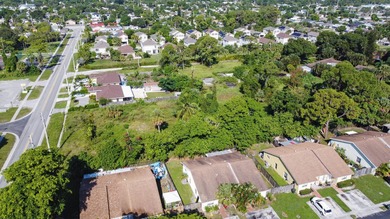 This prime 1.41-acre property in central Lake Worth offers two - photo 13