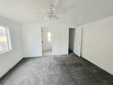 This is a charming, move-in-ready mobile home located in a - photo 15