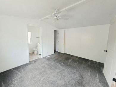 This is a charming, move-in-ready mobile home located in a - photo 16