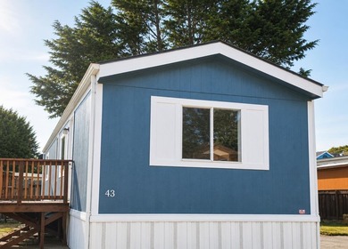 This is a charming, move-in-ready mobile home located in a - photo 17