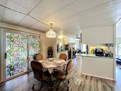 Welcome to Summerloch Green, a spectacular waterfront 55+ - photo 8