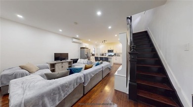 Fully renovated in 2020, this detached single-family home offers - photo 5