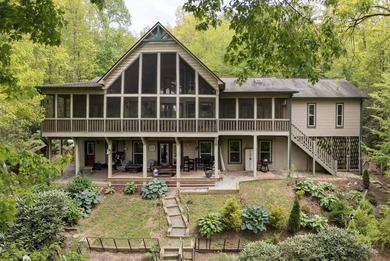 LAKEFRONT living and mountain tranquility in this beautifully - photo 1